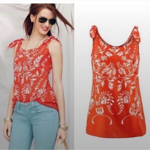 CAbi Mosaic Bright Orange Blouse with White Floral Accents
